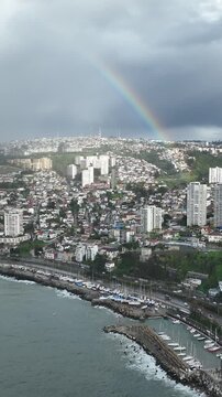 Vina del Mar in Chile with a rainbow. Beautiful aerial image of the coastline. Aerial view, vertical video