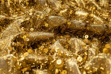 Golden sea of fabric with sequins top view macro
