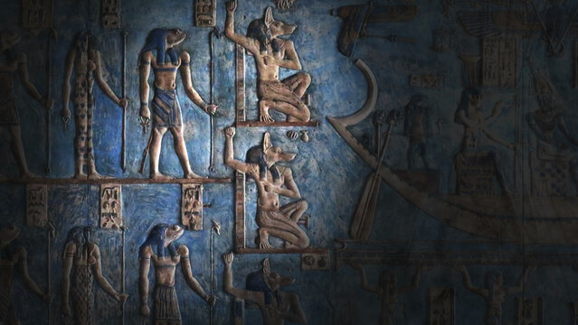 Hieroglyphic carvings and paintings on wall