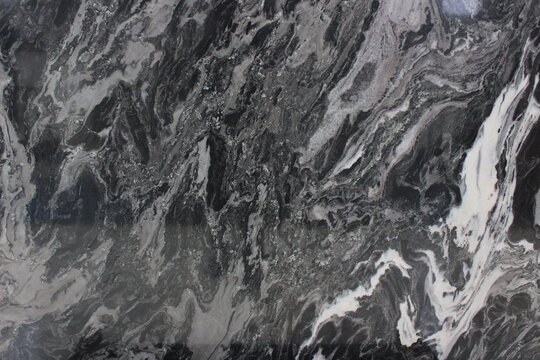 Picasso Gray marble texture with abstract black and white flow patterns resembling a modern art painting.