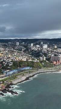 Vina del Mar in Chile with a rainbow. Beautiful aerial image of the coastline. Aerial view, vertical video