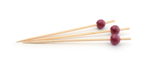 Wooden serving skewers isolated on white.