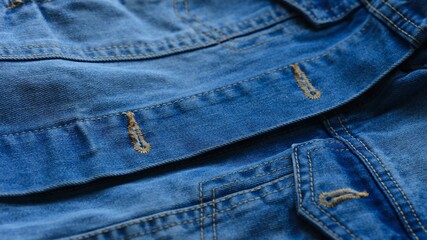 Fototapeta premium Close-up shot of a blue denim jacket. Full frame