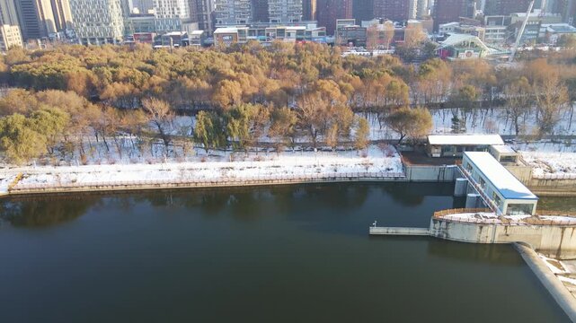 Frozen River and City Skyline Aerial Winter Landscape