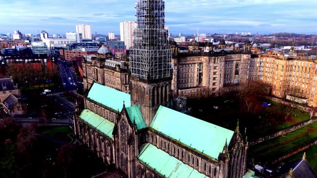 Aerial drone fly towards Glasgow Cathedral during restoration in Scotland