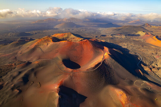 Aerial sunset view of Timanfaya National Park with volcanic colors, Lanzarote