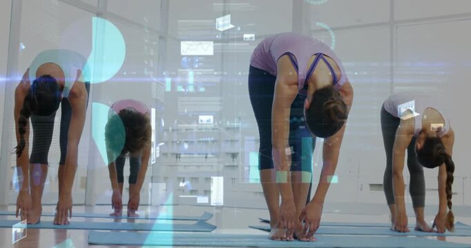 On instructor cue four women flowing into forward fold then rising, studio HUD tracking alignment