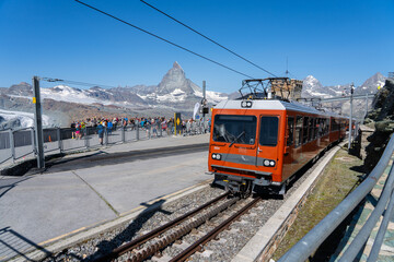 Obraz premium Gornergrat train climbing the Swiss Alps near Zermatt, Switzerland