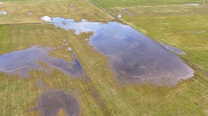 Aerial View of Flooded Agricultural Field with Standing Water