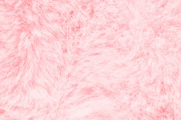 Fototapeta premium Soft pink fluffy texture close-up with gentle fibers for cozy and comfort-themed designs.