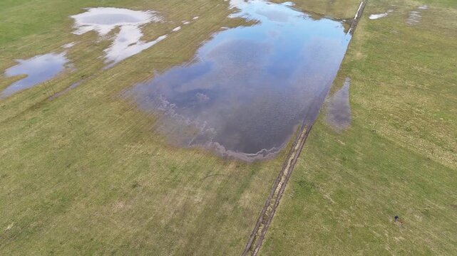 Aerial View of Flooded Agricultural Field with Standing Water