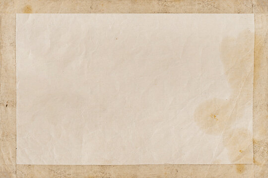 Aged parchment paper sheet with stains and creases on canvas background, vintage blank paper texture with wide copy space. Natural background of old paper texture for document mockup, print