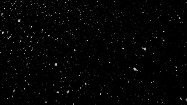 Freeze motion of natural snow falling on black background