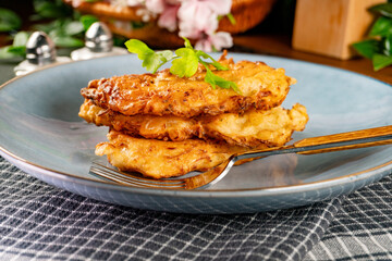 Sauerkraut pancakes (fuczki) with mushroom sauce - a traditional Lemko dish.