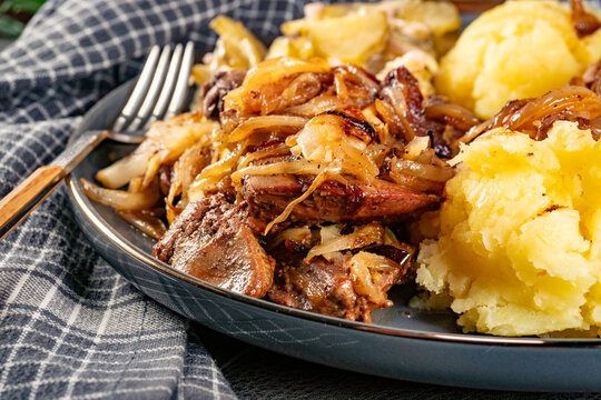 Fried liver with onion.