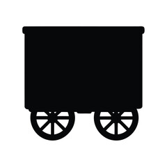 Silhouette of an old west wagon with wheels ready to travel