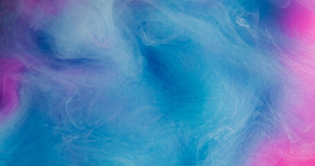 Obraz premium Water paint fog. Color mix smoke. Defocused blue purple pink vibrant splash liquid cloud vapor underwater haze on abstract background.