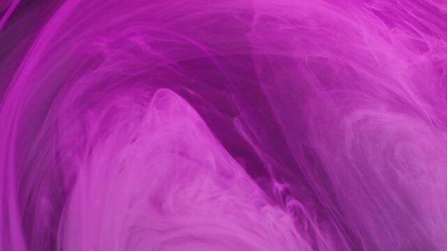 Ink twirl. Smoke swirl background. Defocused purple neon color glitter mist liquid texture floating on acrylic art light abstraction.