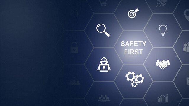 Safety first symbols, work safety, caution work hazards, danger surveillance, zero accident concept. Wooden cubes with smart grey background. Employees safety awareness at workplace