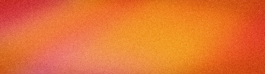 Naklejka premium Abstract wide grainy background with warm orange, red, and pink hues, featuring a soft blur and noise texture perfect for summer banners, art, and wallpapers