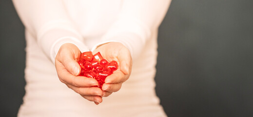 red heart in hands