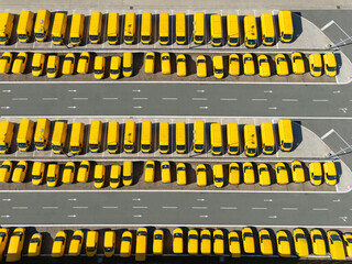 Delivery vans hub. Fleet of yellow post vehicles