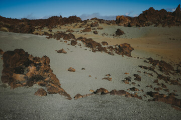 Beautiful volcanic rocks and desert with green sand in Teide National Park, Tenerife, Canarian islands, Spain
