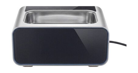 Ultrasonic cleaner with a rounded edge design and touch-sensitive interface.