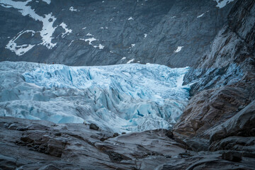 Nigardsbreen Glacier with Blue Ice and Rocky Valley in Norway