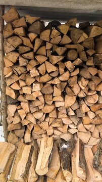 Ukraine: A Ukrainian soldier prepares firewood for the cold winter in the Carpathians to protect the border.