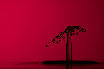 Color drops splash with umbrella or balls in fresh water