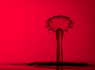 Color drops splash with umbrella or balls in fresh water