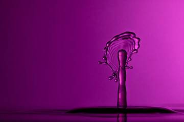 Color drops splash with umbrella or balls in fresh water