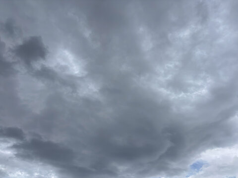 Dark stormy clouds in grey sky, overcast weather background before rain or thunderstorm, dramatic atmospheric scene, concept of meteorology, climate change, weather forecasting