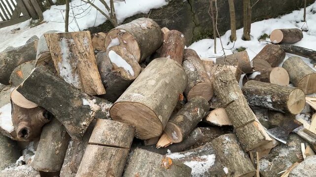 Ukraine: A Ukrainian soldier prepares firewood for the cold winter in the Carpathians to protect the border.