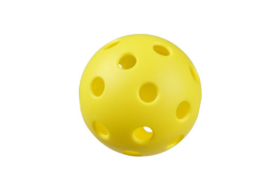 Yellow plastic pickleball isolated in PNG on transparent background