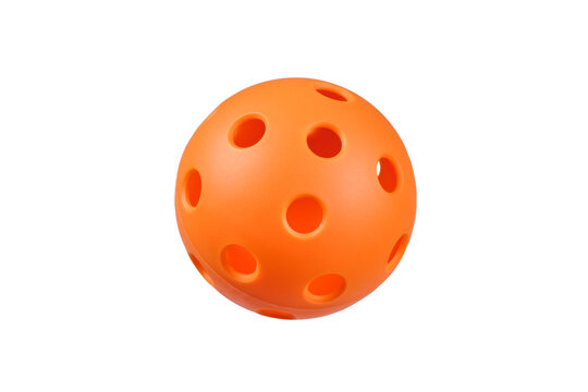 Orange plastic pickleball isolated in PNG on transparent background