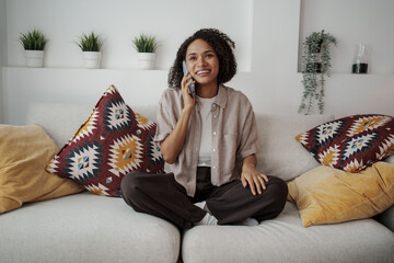 Woman Talking Happily, Woman Relaxing And Chatting, Woman Lounges On Couch During Cheerful Call