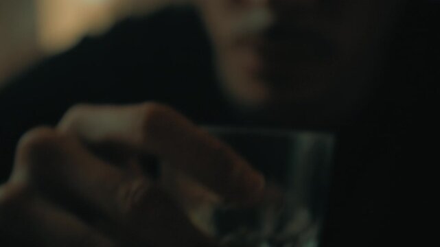 Boy drinks water in a gloomy atmosphere