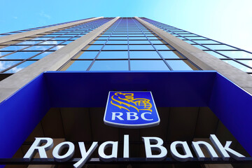 Fototapeta premium TORONTO - OCT 11: Sign of RBC (Royal Bank of Canada) at branch office in Toronto on Oct 11 2025. RBC is a Canadian multinational financial services company. 
