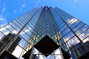 Fototapeta premium TORONTO - OCT 11: Sign of RBC (Royal Bank of Canada) at branch office in Toronto on Oct 11 2025. RBC is a Canadian multinational financial services company. 
