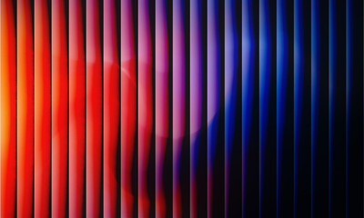 Vertical gradient stripes background with red, orange, purple, and blue color transition, abstract textured pattern