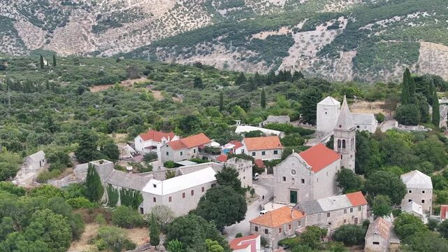 Aerial view of the Museum of Brac and St. Helena Church in the historic village of Skrip, Brac Island, Croatia.