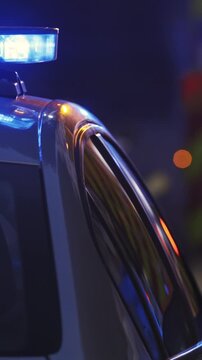 Blue police flashing light at night time