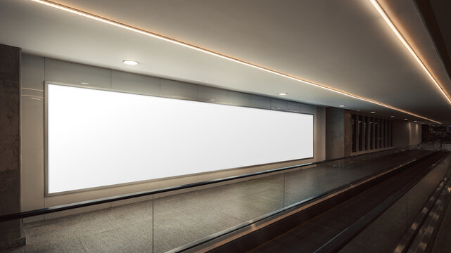 Long blank advertising billboard mockup on wall beside airport moving walkway, modern corridor interior with glass railing, ceiling lights, perspective view, huge copy space for branding