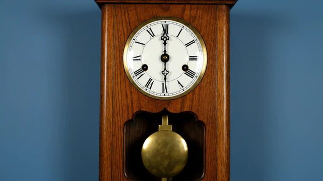 An antique grandfather clock with a gold pendulum and vintage face hangs on an old wooden wall as a retro time object