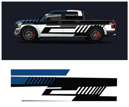 White pickup truck with black and white side decals and design elements