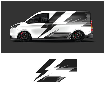 White van with black lightning bolt decal design on side panel