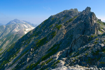 Obraz premium 北アルプスの立山、雄山付近から望む大汝山と後方の剱岳