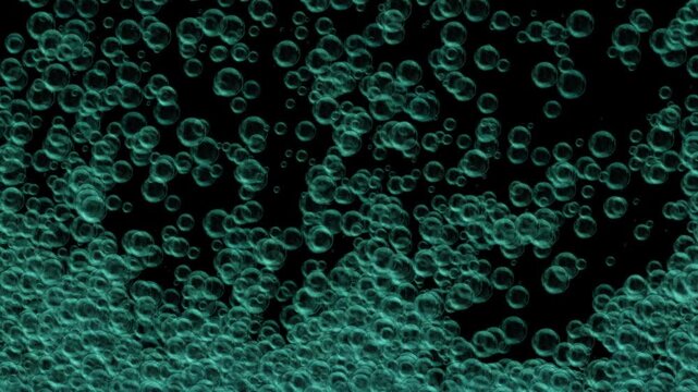 Bubbles drift and overlap in a greenish-blue field against black